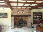 Exning, Newmarket, Suffolk New Build: Fireplace and Woodburner with Oak Beam Mantel
